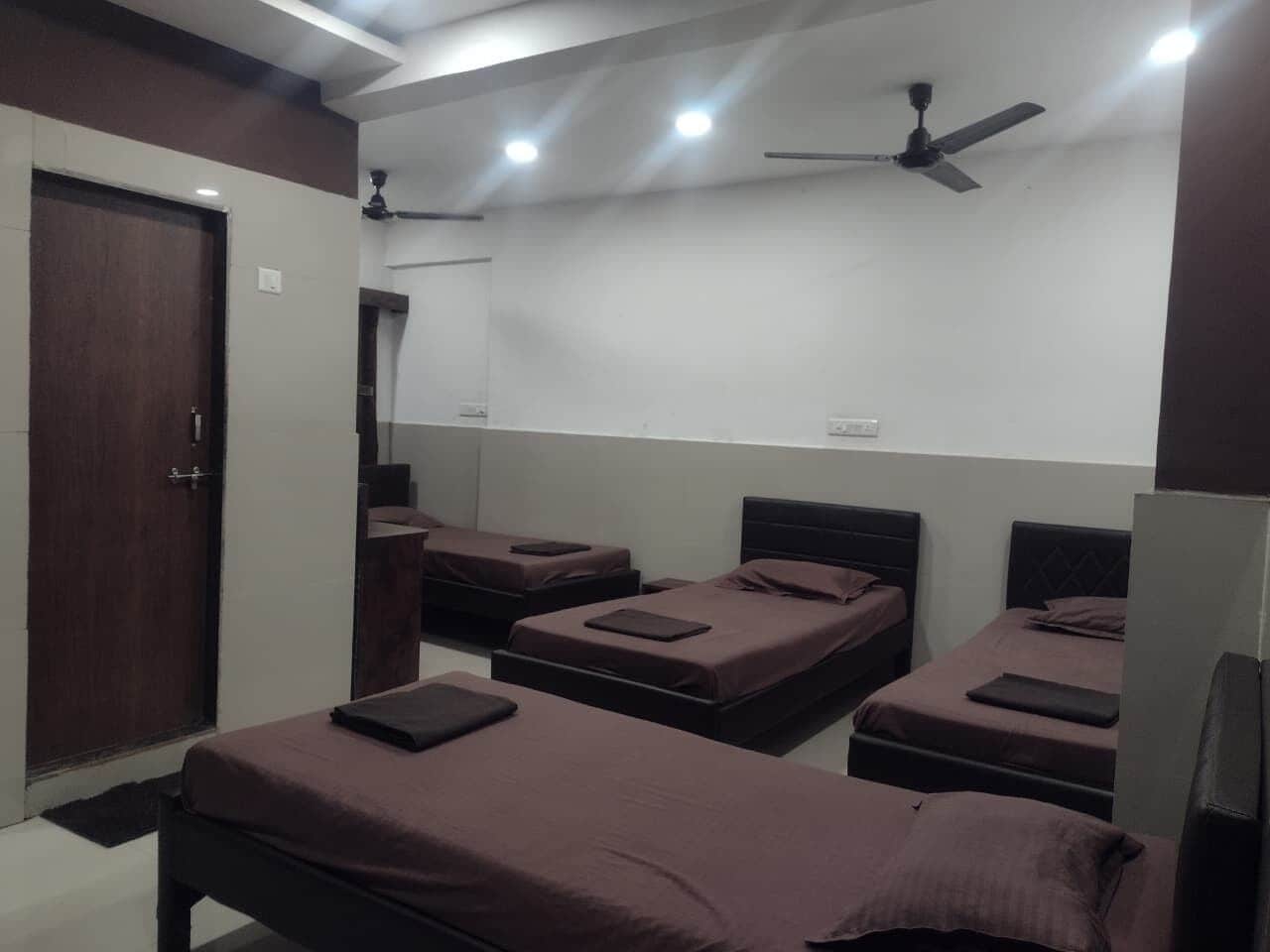 Standard Quadruple Room, Multiple Beds, City View | In-room safe, individually decorated, individually furnished, desk