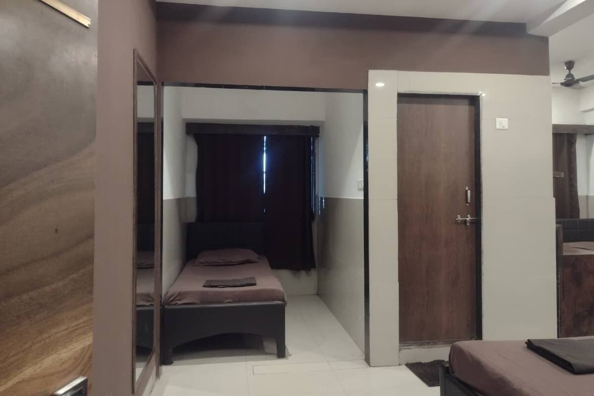 Standard Quadruple Room, Multiple Beds, City View | In-room safe, desk, laptop workspace, blackout drapes