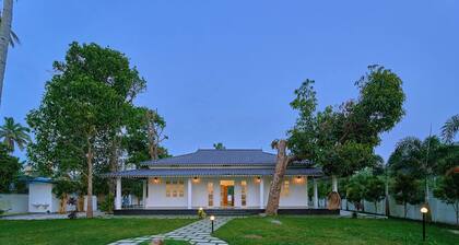 Ashtamudi Lake Villa by VOYE HOMES