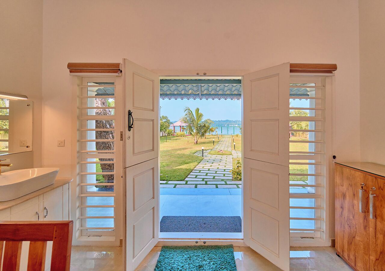 Villa, Lake View | Living area | 35-inch LED TV with cable channels