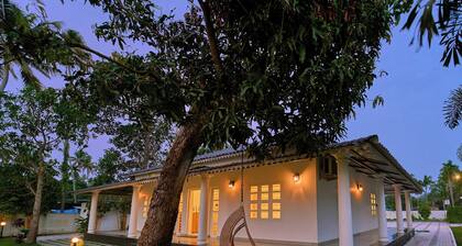 Ashtamudi Lake Villa by VOYE HOMES