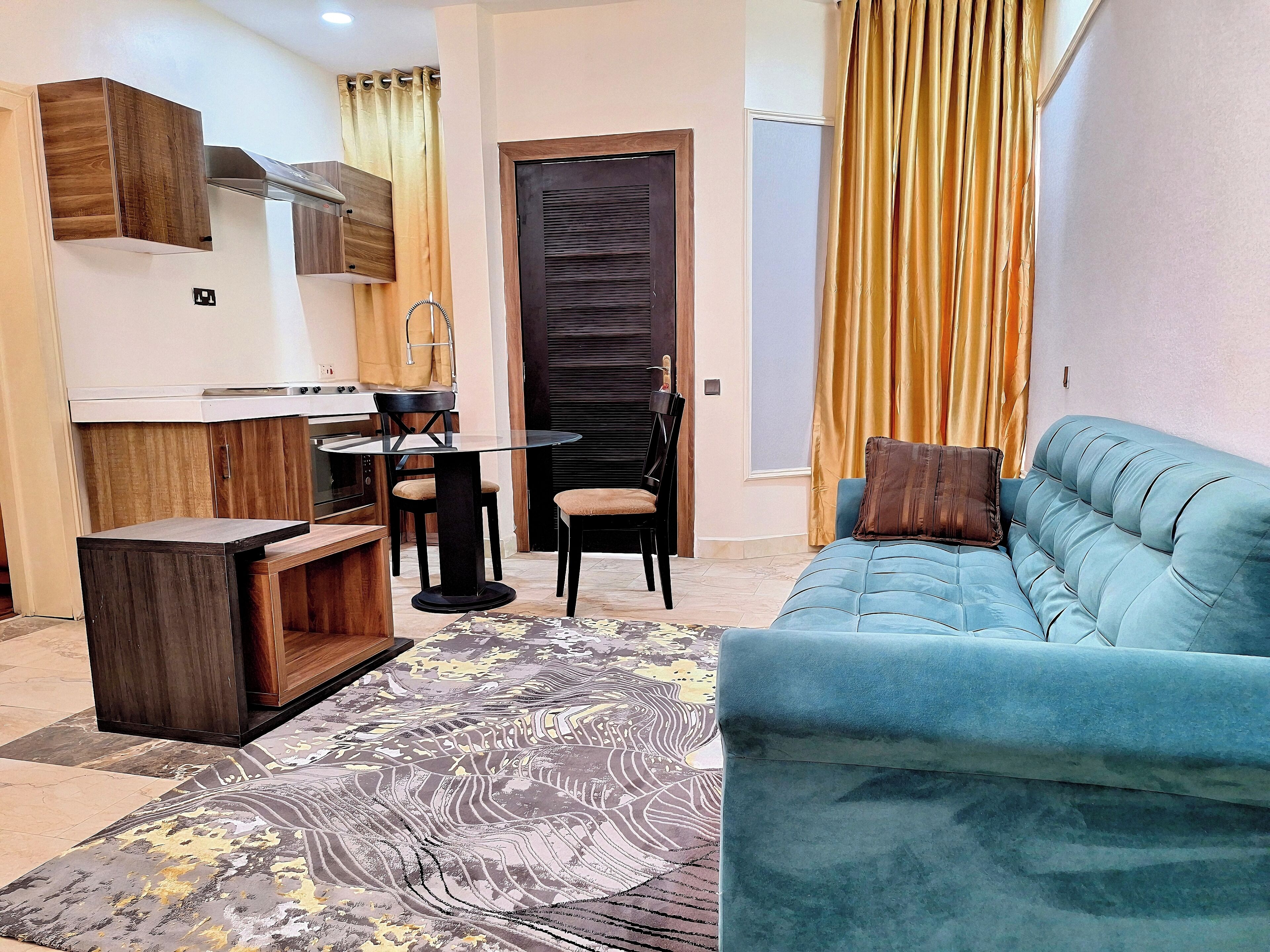 Suite Luxe, vue ville | Coin séjour