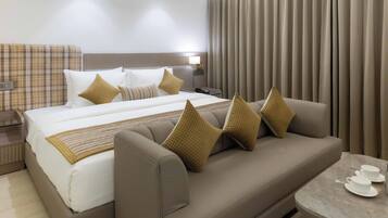 Junior Suite, City View | Desk, laptop workspace, iron/ironing board, free WiFi