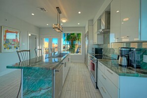 Fridge, microwave, oven, stovetop - Modern Coastal Home w/ Balcony, Firepit & Prime Port A Location | Casa Blanca (Port Aransas)