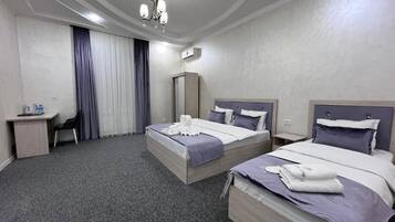 Family Triple Room, Non Smoking | Desk, laptop workspace, free WiFi