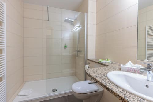Hair dryer, towels, soap, shampoo