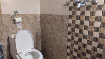 Shower, towels, soap, shampoo