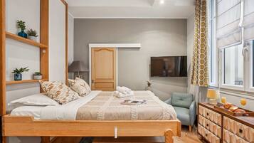 1 bedroom, desk, iron/ironing board, travel cot