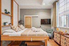 1 bedroom, desk, iron/ironing board, travel cot