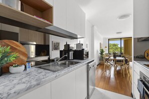 Fridge, microwave, oven, stovetop - Bright & Spacious Surry Hills Apartment (Surry Hills)