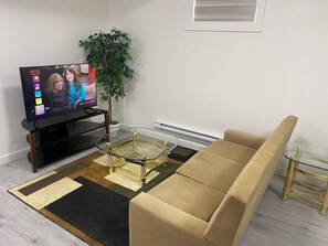 Living area - Cozy 2-Bedroom Suite in Aspen Ridge (Saskatoon)