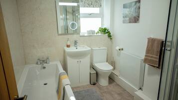 Hair dryer, towels, soap, toilet paper