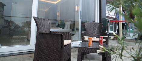 Suite, 1 Bedroom, Balcony, City View | Living area | 32-inch Smart TV with digital channels