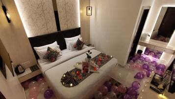 Deluxe Double Room | Minibar, desk, laptop workspace, blackout drapes