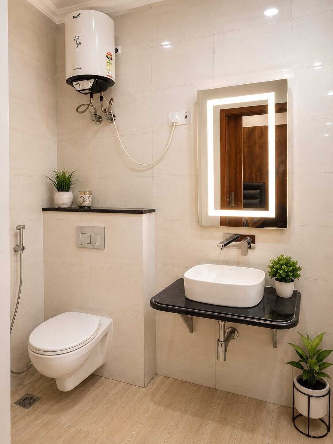 Une salle de bain moderne équipée de toilettes, d’un lavabo et d’une douche.