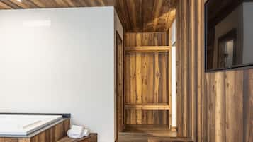 Een douche, een bubbelbad, een haardroger, een bidet