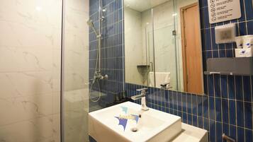 Hair dryer, bidet, towels, soap