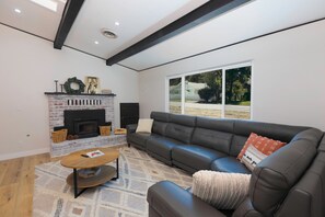 Comfort House, 5 Bedrooms, Patio, Mountain View | Living room | 32-inch TV with digital channels, fireplace - Bear Mountain Getaway (Big Bear Lake)