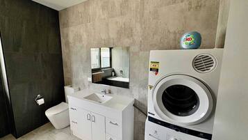 Shower, hair dryer, towels
