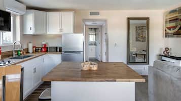 Microwave, stovetop, dishwasher, coffee/tea maker