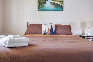 1 habitación, tabla de planchar con plancha, wifi y ropa de cama