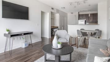 Apartment (1 Bedroom) | Living area | 50-inch TV with digital channels