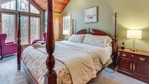 A bedroom with a four-poster bed, a wooden ceiling, and large windows. - Grand Wintergreen Resort Home w/ Hot Tub! (Nellysford)