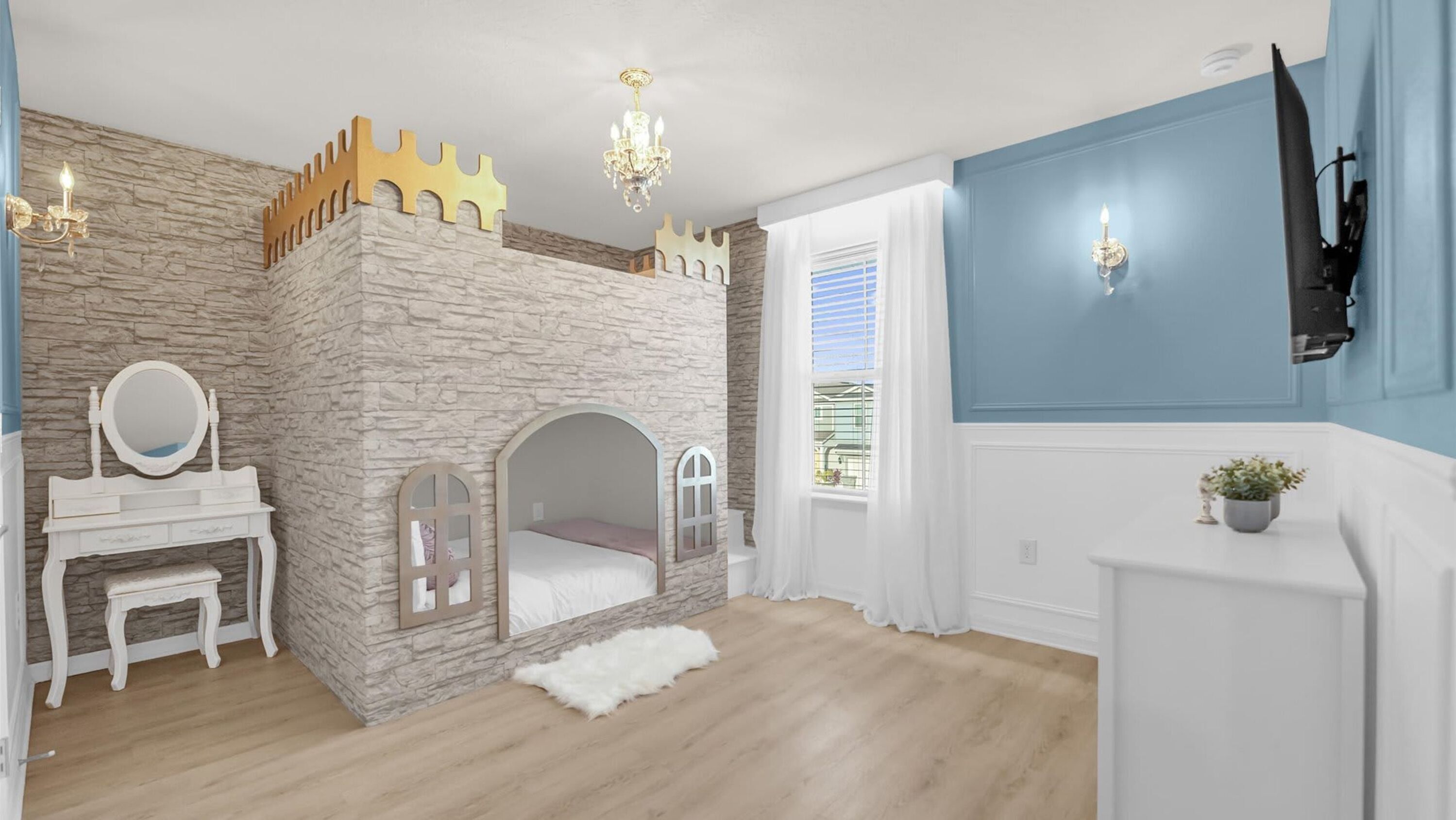 Un dormitorio con pared de piedra, una cama, un tocador con espejo y un televisor montado en la pared.