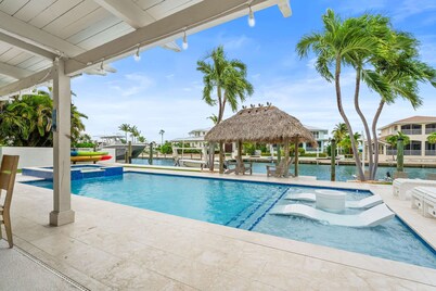 Deep Blue Waterfront Gem Pool Kayaks Dock