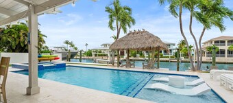 Deep Blue Waterfront Gem Pool Kayaks Dock