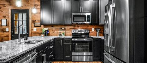 Cabin, 3 Bedrooms | Private kitchen | Fridge, oven, coffee/tea maker, toaster