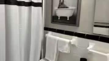 Hair dryer, towels, soap, shampoo