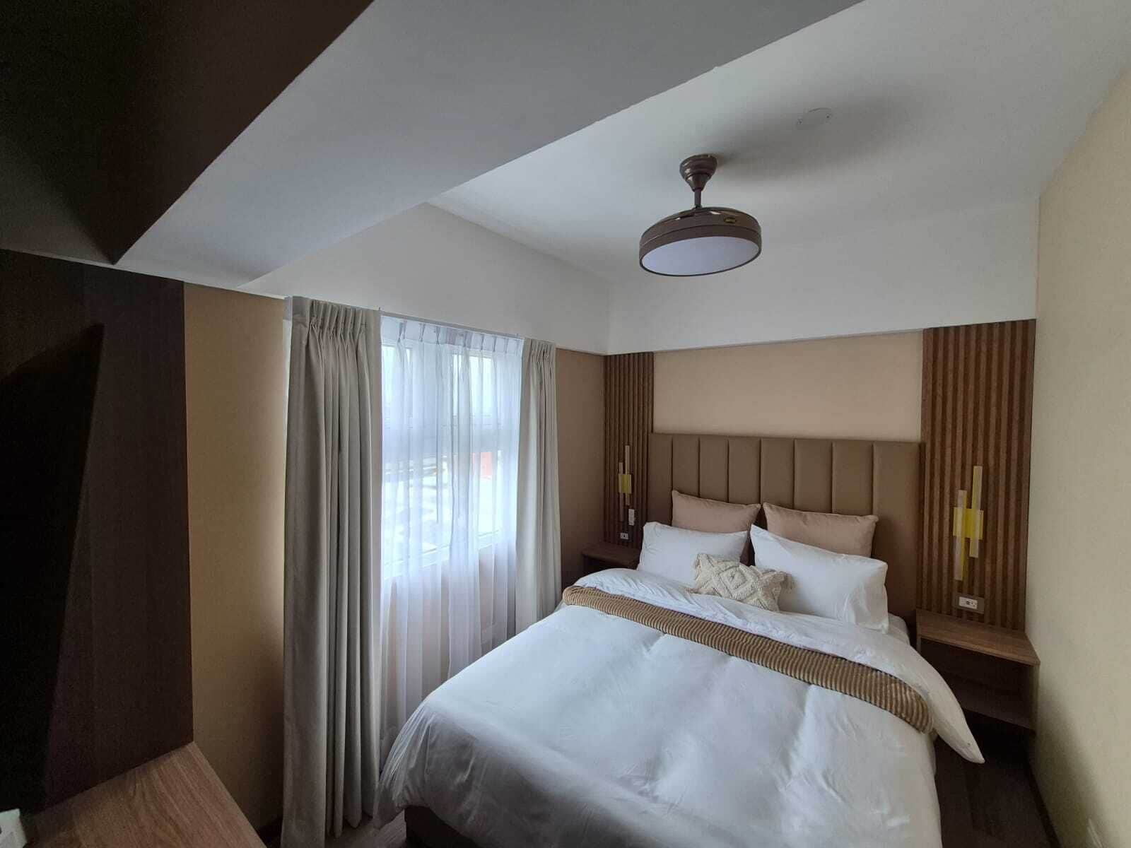 Family Apartment, City View | In-room safe, blackout drapes, soundproofing, iron/ironing board