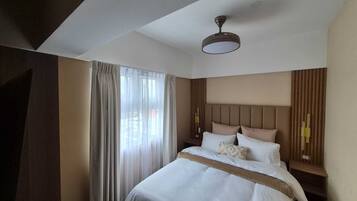 Family Apartment, City View | In-room safe, blackout drapes, soundproofing, iron/ironing board