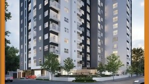 Un immeuble résidentiel moderne à plusieurs étages, doté de balcons, d’une entrée sécurisée et d’un espace paysager agrémenté d’arbres.