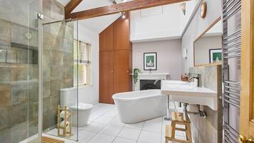 Shower, hair dryer, towels, shampoo