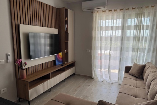 Superior Apartment, City View | Living area | TV