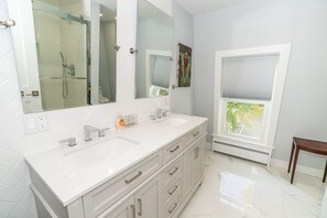 Shower, hair dryer, towels, soap