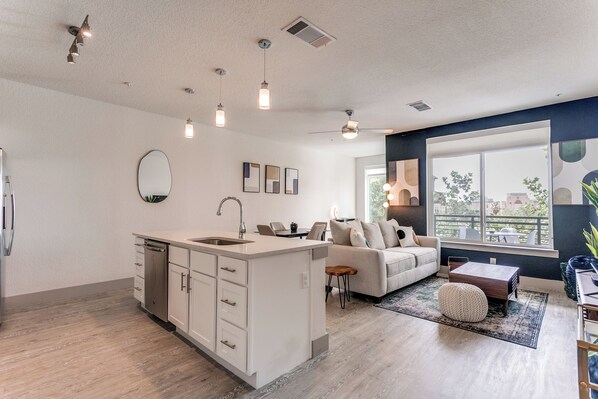 Condo, 1 Bedroom, Accessible, Smoking | Living room | Books - Riverwalk Oasis With Riverwalk Views Free Parking (San Antonio)