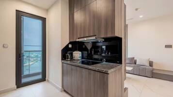 Family Suite, 3 Bedrooms, Club Lounge Access, Harbor View | Private kitchen | Full-size fridge, microwave, oven, stovetop
