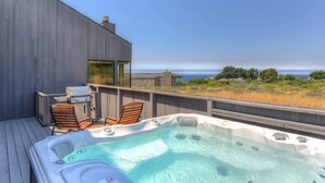A hot tub on a deck with a view of the ocean. - Pacific FantaSea - Sea Ranch 2BR+Loft, Hot Tub, 6 (Sea Ranch)