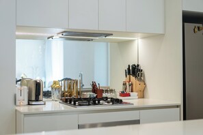Fridge, microwave, oven, stovetop - Artsy 2BR 2BA Retreat in West Village, West End Brisbane (West End)