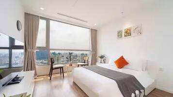 Suíte família, 3 quartos, acesso ao Club Lounge, vista para a cidade | Vista do quarto