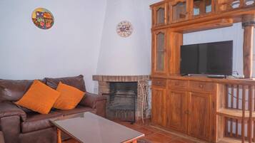 Televisión de pantalla plana de 42 pulgadas con canales por cable