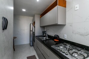 Apartment | Private kitchen - Barra Max - Praia e Conforto. (Rio de Janeiro)