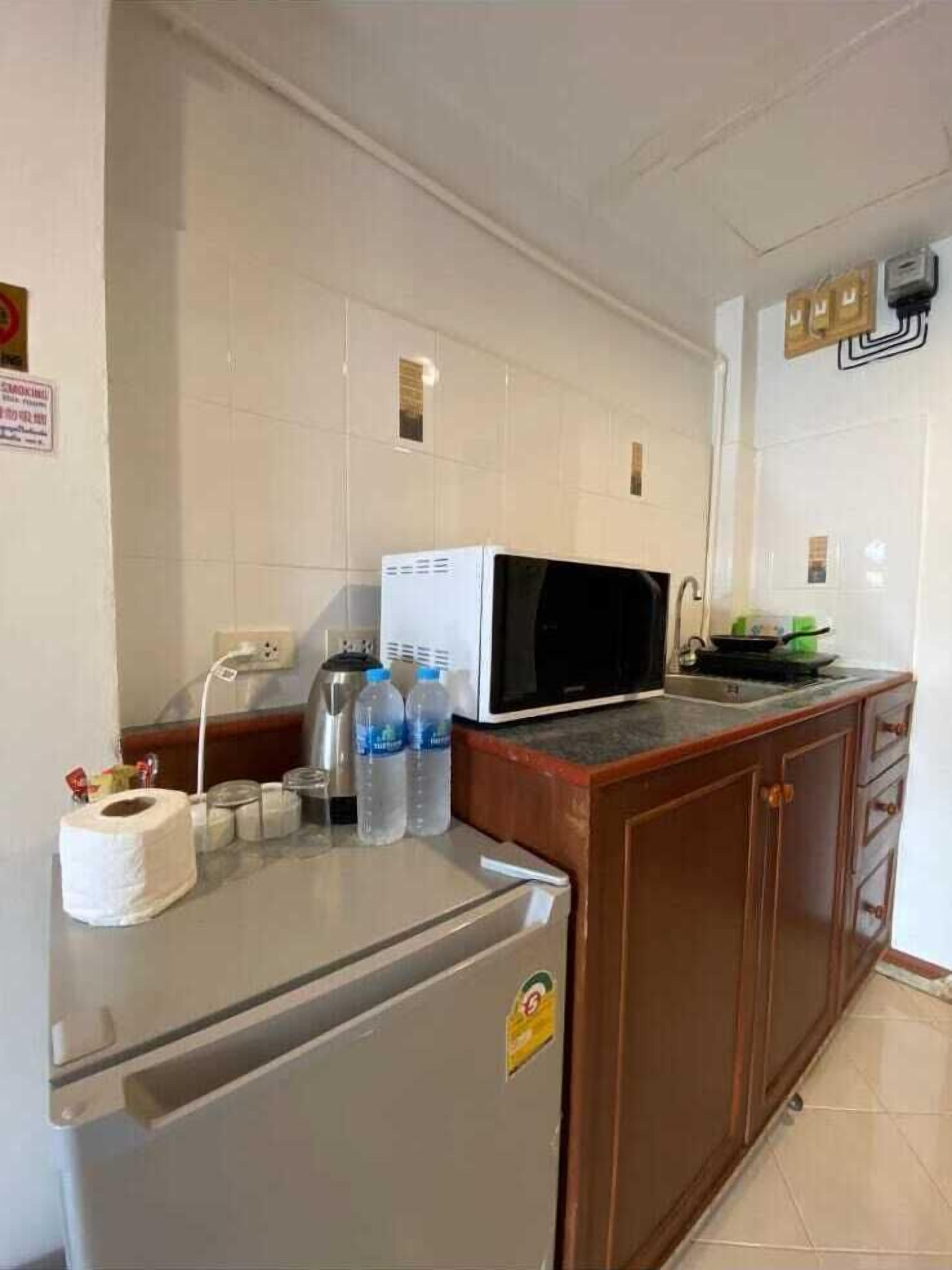 Chambre Triple, balcon, vue océan | Bureau, espace de travail pour ordinateur portable