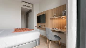 Suite familiar, 3 habitaciones, con acceso al salón lounge del club, vista a la ciudad | Sábanas de algodón egipcio, ropa de cama de alta calidad y edredón