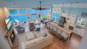 TV, fireplace, books