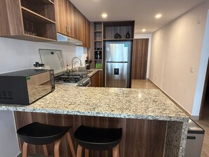 Fridge, microwave, oven, stovetop