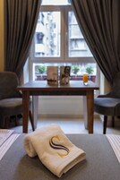 Deluxe Double Room, City View | Living area | 42-inch LED TV with satellite channels, Netflix, streaming services